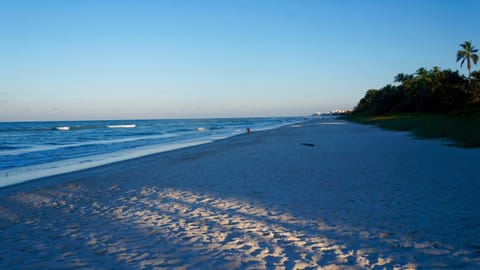 On the beach, sun loungers, beach towels