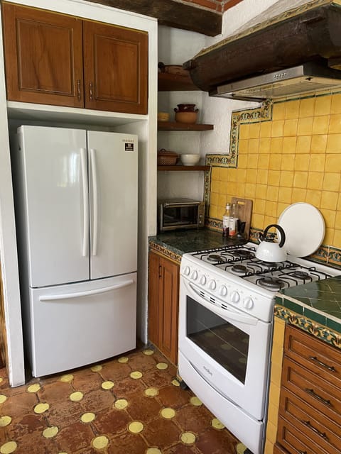 The refrigerator and 5 burner gas stove are brand new.