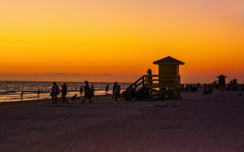 On the beach, sun loungers, beach towels