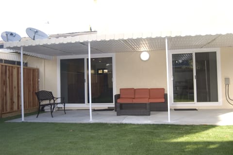 Enjoy an early morning coffee or evening glass of California wine in the back