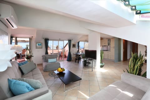 Open space living room 50 sqm large with stunning views on Mt. Etna, the histori