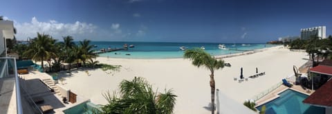 On the beach, sun loungers, beach towels