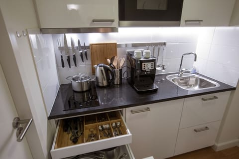 Fridge, microwave, stovetop, coffee/tea maker