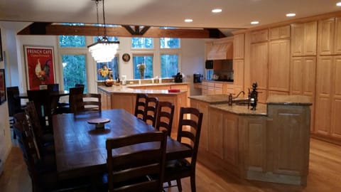 Another view into kitchen. Notice the Sub-Zero Fridge!