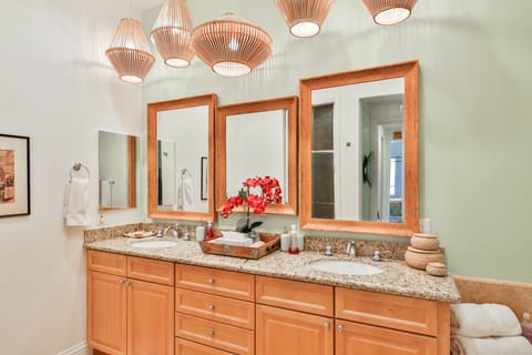 Master bath with double sinks and beautiful new lighting