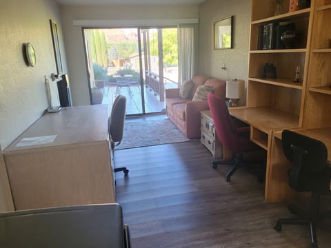 Private office & entry with 2 desks and great view, combined with laundry room