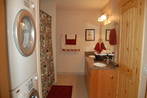 Combined shower/tub, hair dryer, towels, soap