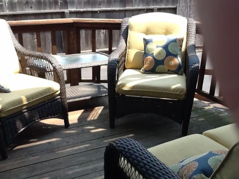 Deck off of kitchen with comfortable seating. Gas BBQ provided for grilling.