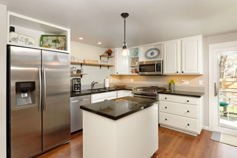 Fully stocked kitchen with gas range and oven