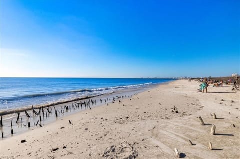 On the beach, sun loungers, beach towels