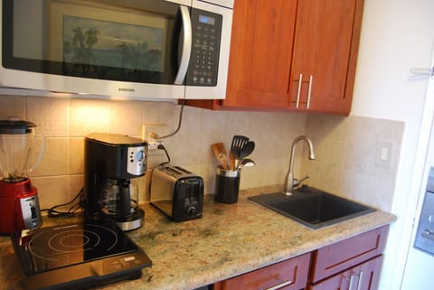 Fridge, microwave, coffee/tea maker, toaster