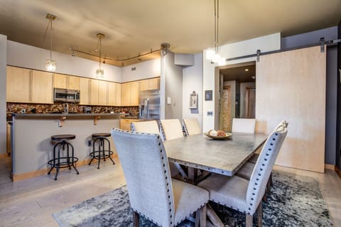 Sliding barn door that closes to give the second bedroom and bath privacy.