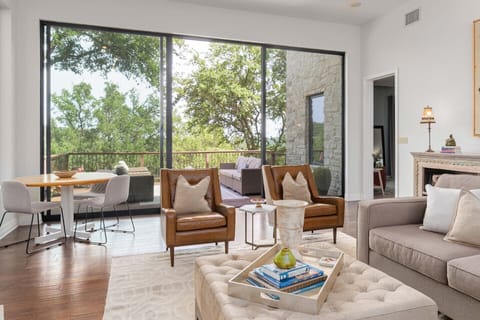 Gorgeous and open great room with views of the outside welcomes you in the home.