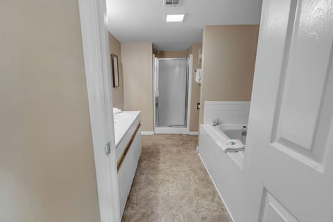 Shower, jetted tub, towels