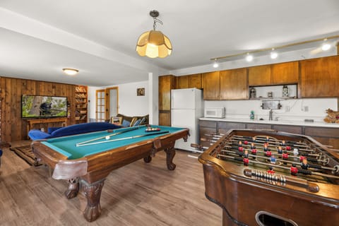Game Room - Game Room Pool Table and Foosball Table for family bonding located downstairs.