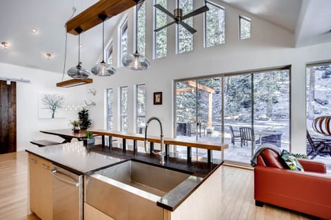 Fully equipped kitchen with tons of light from windows