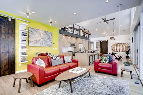 Living room for socializing, staring at Wilderness or TV watching post busy day