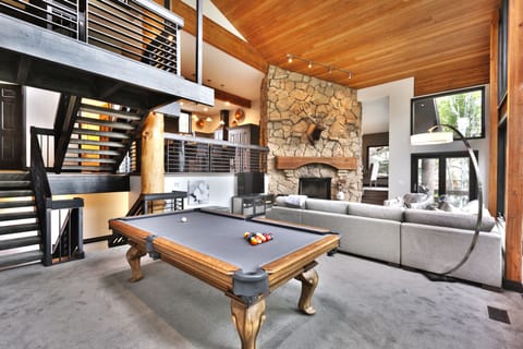 This awesome pool table makes this space so much more fun!