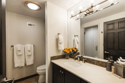 Bedroom #3 en suite bathroom. Shower, tub, toilet.
