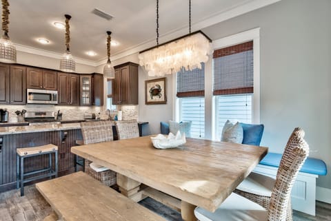 Custom made kitchen table can seat between 12-14 people