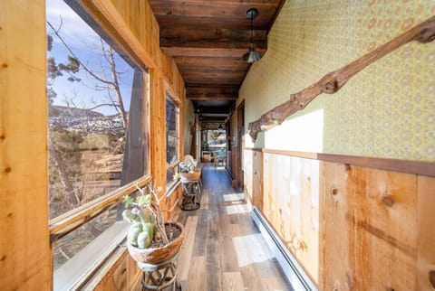 Hallway leading to kitchen. Laundry on right