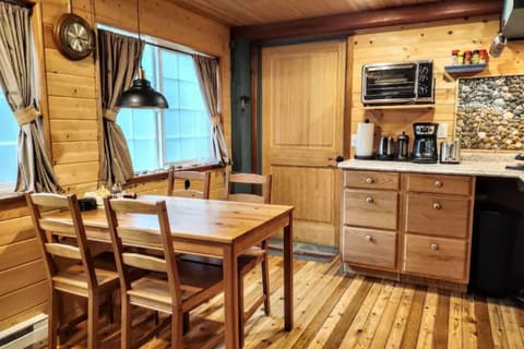 Dining area. Included - all dishes, utensils, pots & pans, spices & lots more!