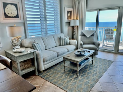 Living Area with Plantation Shutters,  Room Darkening Curtains and South Balcony