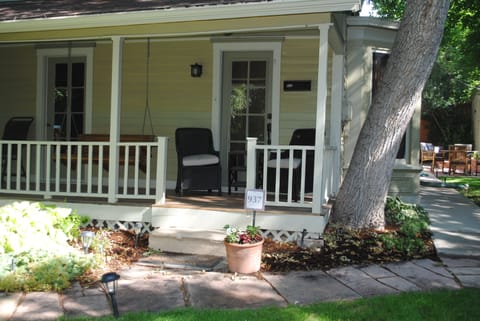 Amazingly inviting front porch for relaxing with coffee or a good book