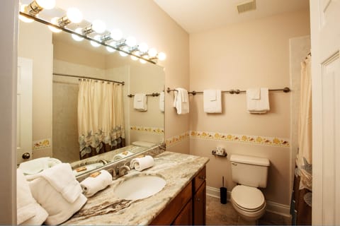 Combined shower/tub, hair dryer, towels, soap