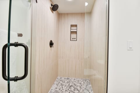 Combined shower/tub, hair dryer, towels, soap