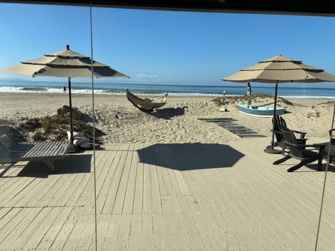 On the beach, sun loungers