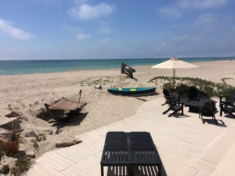 On the beach, sun loungers