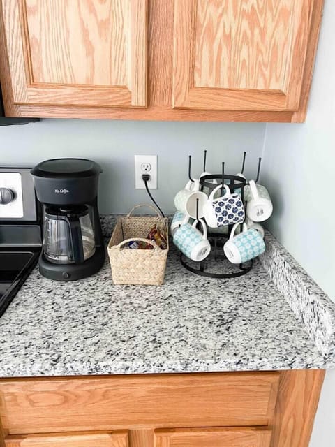 Coffee and tea provided, along with sugar and creamers.