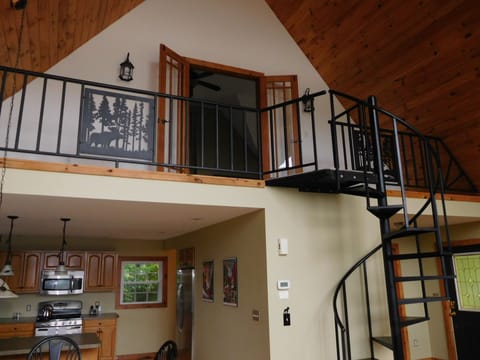 Loft upstairs leading to master bedroom and bath