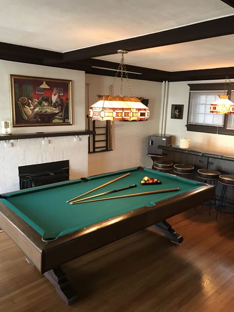 View of Game Room with Fireplace, Pool Table, Dart Board and Games Galore!