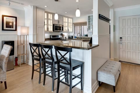 View of kitchen from dining room -bar counter seating