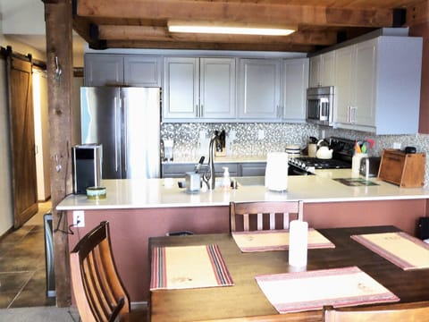 Dining room with expandable table for 6 -