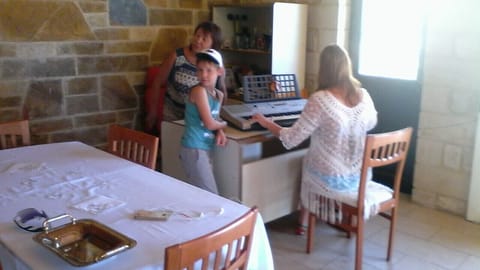 tourists playing electronic piano