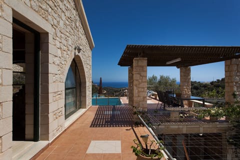 the front of the house with view of the sea