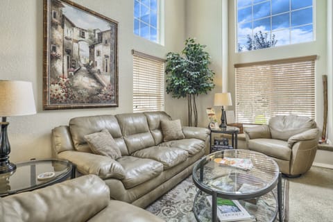 Living Room boasts a comfortable couch, two swivel chair & two touch lamps!