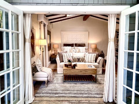 Beautiful French doors open up to your living space and outdoor garden