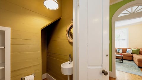 There's a convenient half bath just off the living room...