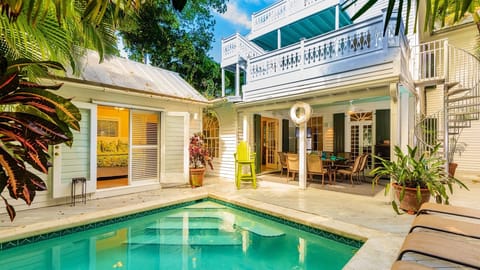 CASA VICTORIA is a large 5 bedroom home built with the charm of early 20th century Key West...