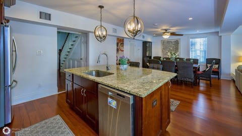 The kitchen is open to the living area and equipped with luxury appliances...