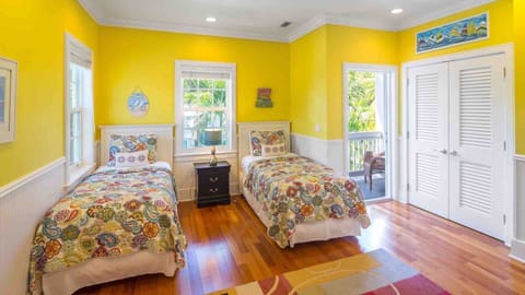 The Smiling Ibis - The third bedroom has Two Twin beds that can be converted to a King bed upon request...