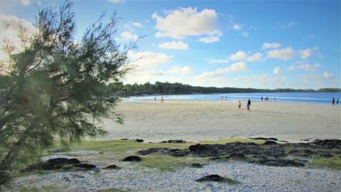 On the beach, sun loungers, beach towels