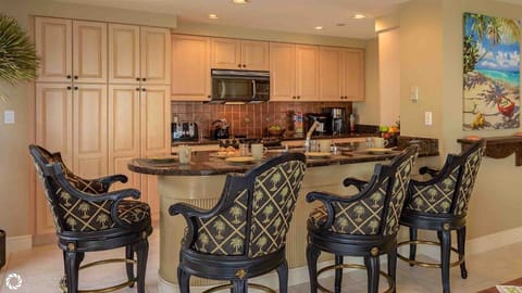 Enjoy a casual meal or just keep the chef company from the bar seating...