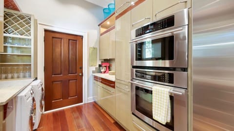 The kitchen features modern appliances...