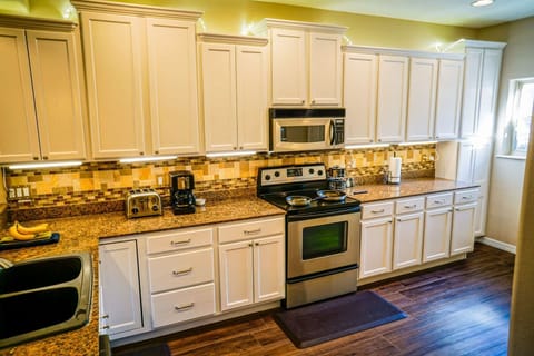 Fully Equipped Kitchen with Granite Counter Tops.
