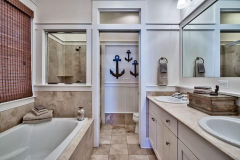 Combined shower/tub, hair dryer, towels, soap